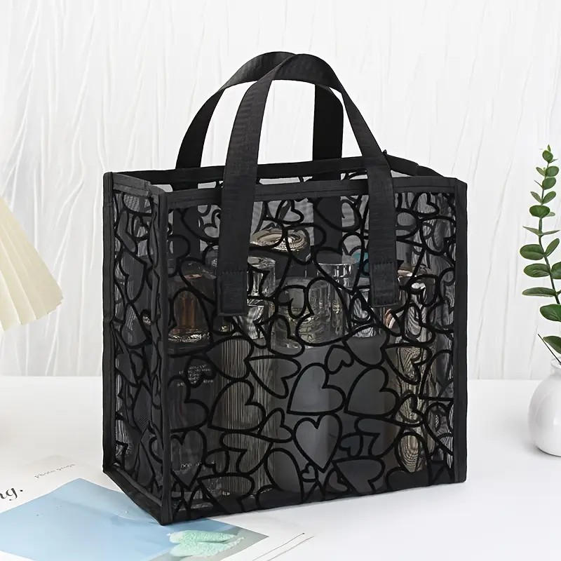 Bolso negro de corazones
