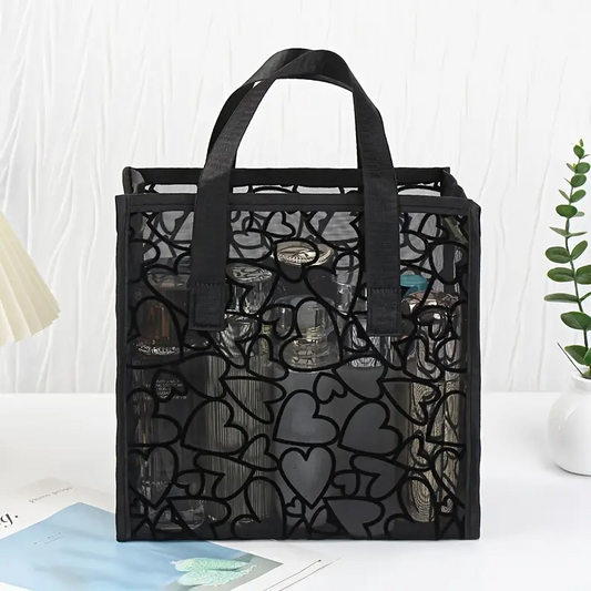 Bolso negro de corazones